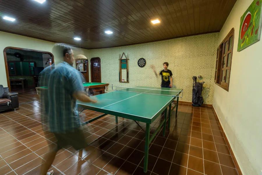 Game room Enjoying a fierce match of ping pong in the lodge's game room before dinner
