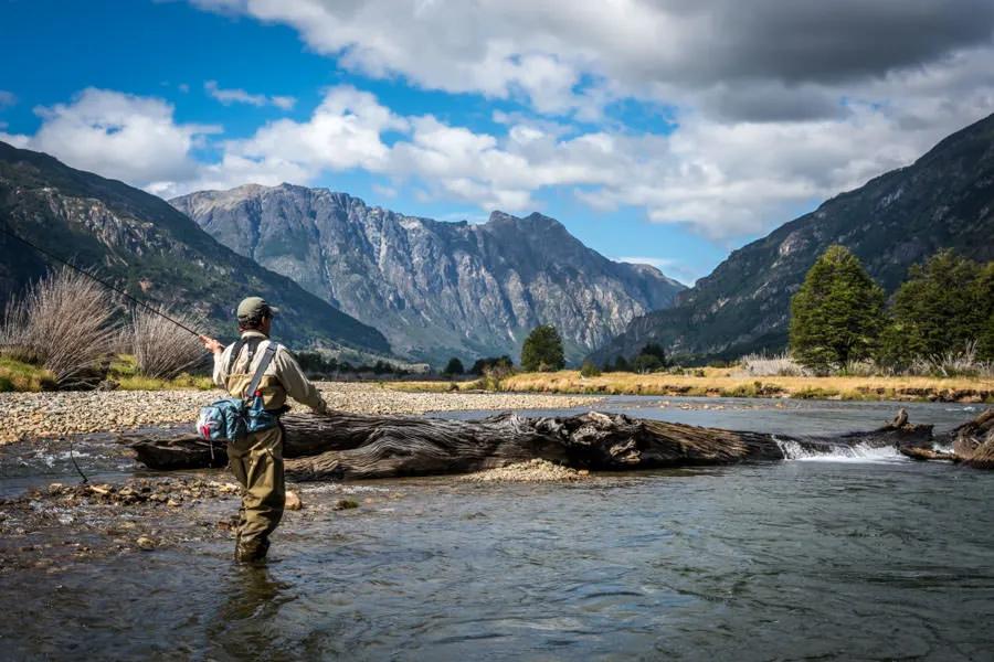 Many of Chile's rivers and lakes are back-dropped by mountains that rise straight up into the sky. 