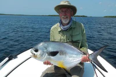 One lucky angler with his first permit on a fly