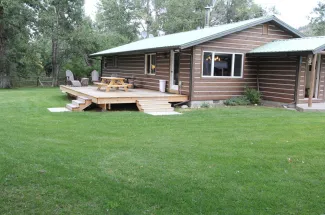 Evening deck time is a must at Boulder River Outpost