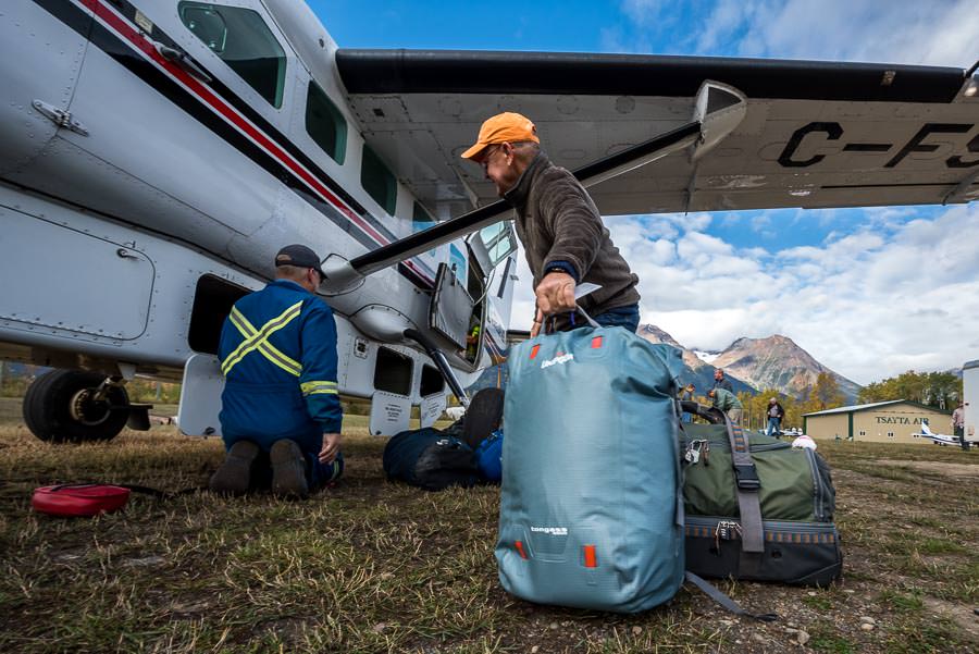 Stowing gear bags under the plane