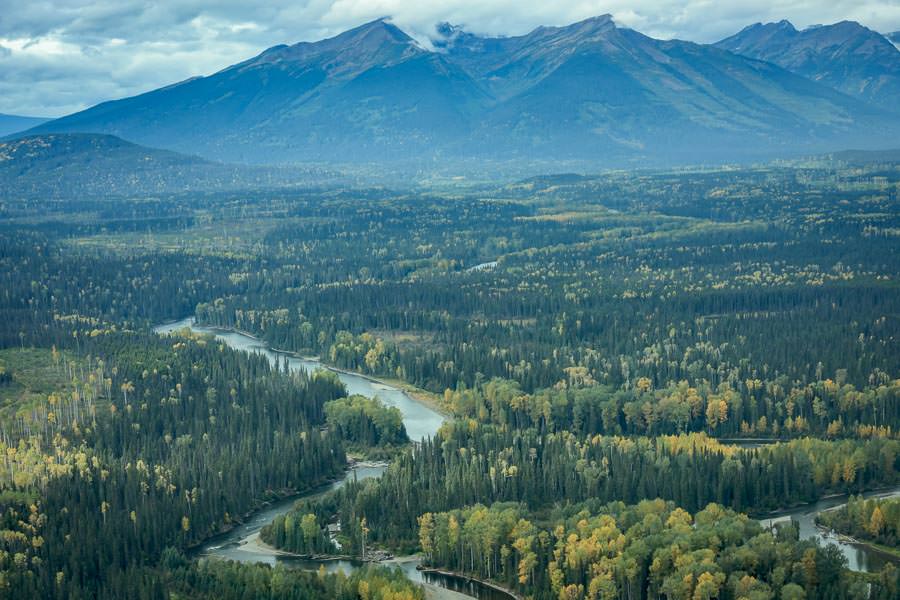 Glacier peaks giving way to broad river valleys