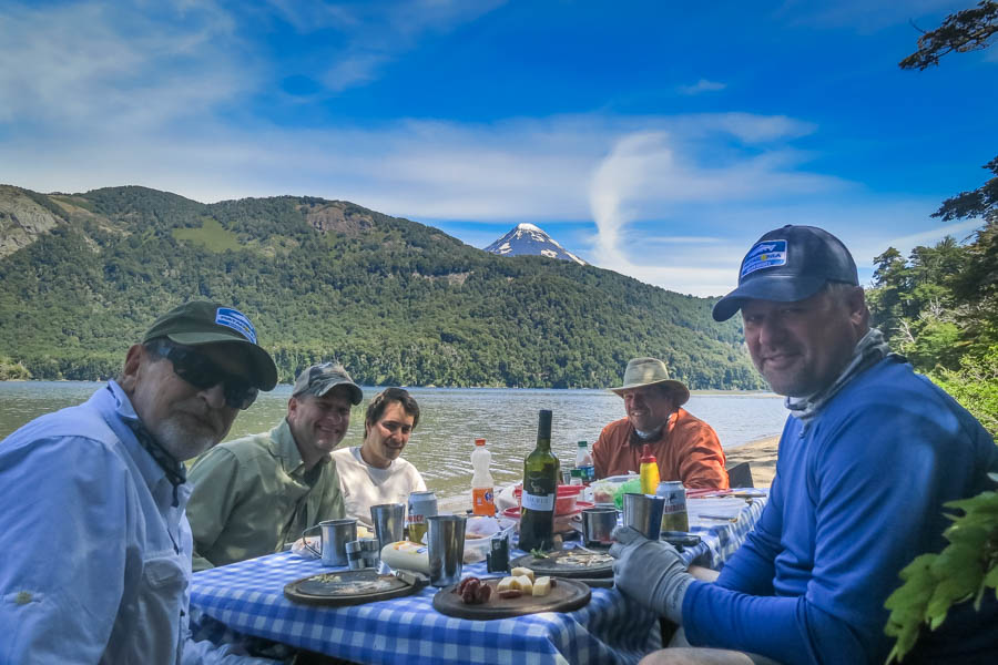 Lunch on Lago Tromen below the Lenin Volcano.  Lago Tromen is home to huge browns that eat big dry flies.  It is the source of the famous Malleo River