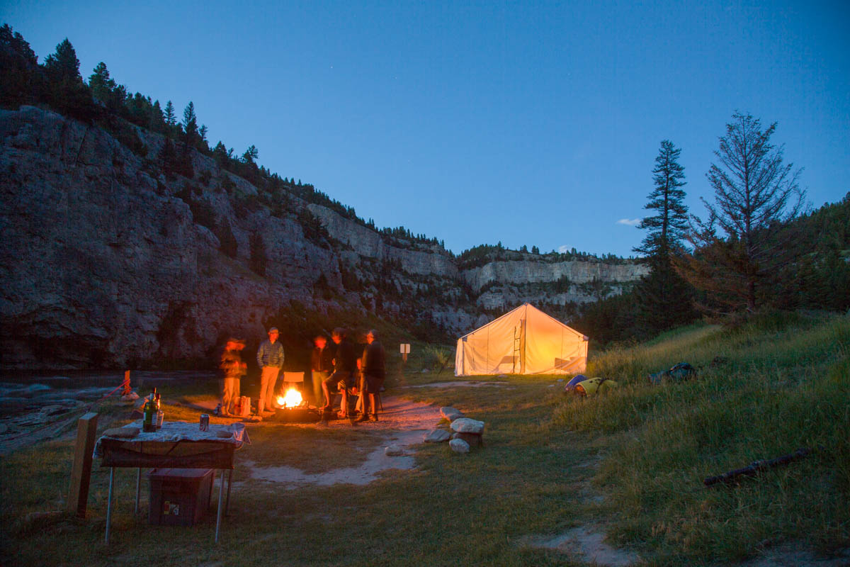 Standing around the fire or skating caddis at last light, both are good options!