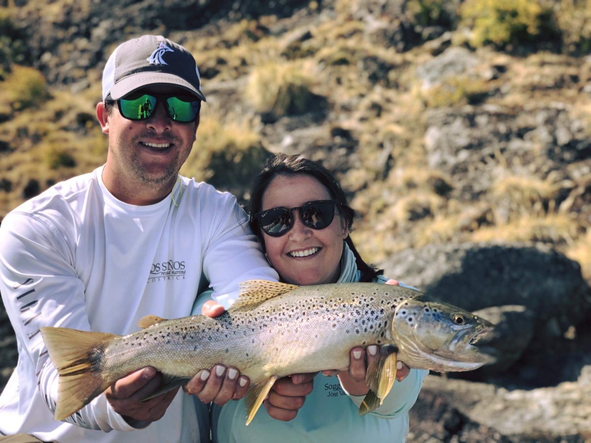 Anna Eagerton Stoudenmire and Capers Stoudenmire with a nice brown caught in Lake Bertrand